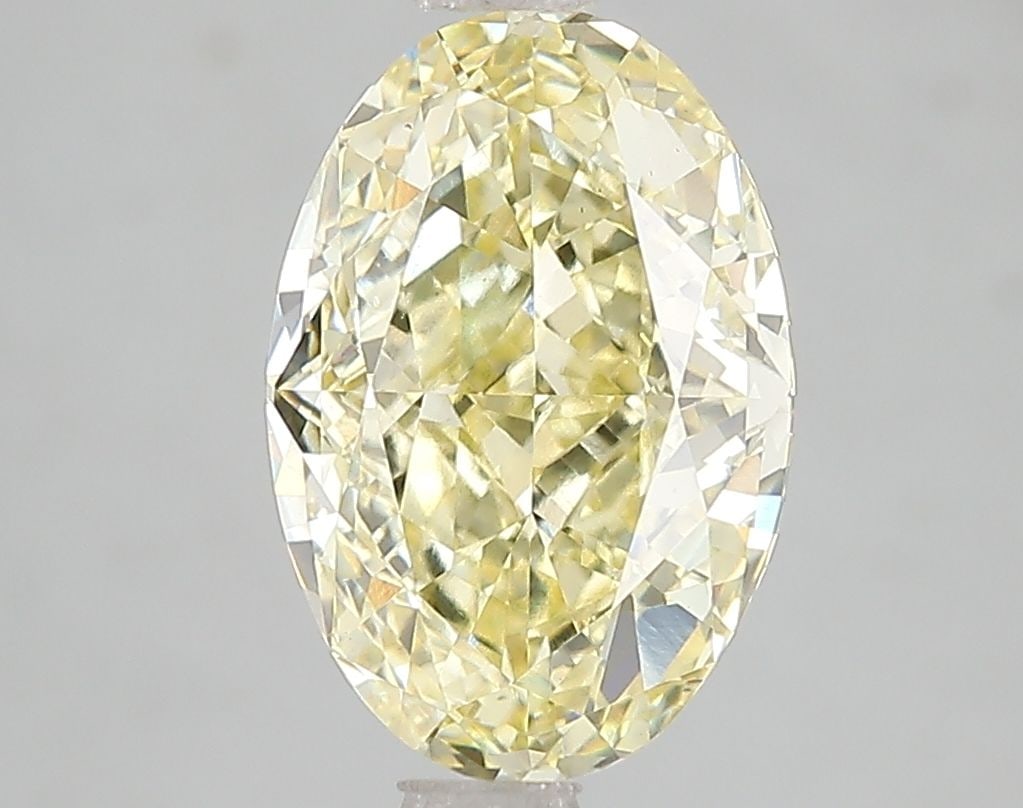 Loose Diamond - OVAL 3.1ct Fancy Intense Yellow VS1: Loose Diamond - OVAL 3.1ct Fancy Intense Yellow VS1 Source: This is a real non-mined Diamond that has been grown in a lab Shape: OVAL Carats: 3.1 Color: Fancy Intense Yellow Certification: IGI Video: