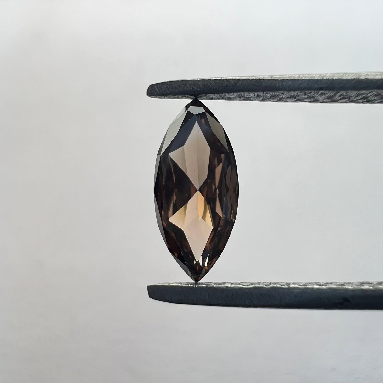 Loose Diamond - MARQUISE 0.44ct Brown VVS2: Loose Diamond - MARQUISE 0.44ct Brown VVS2 Source: This is a real non-mined Diamond that has been grown in a lab Shape: MARQUISE Carats: 0.44 Color: Brown Certification: NONE The Diamond Depot Guarant