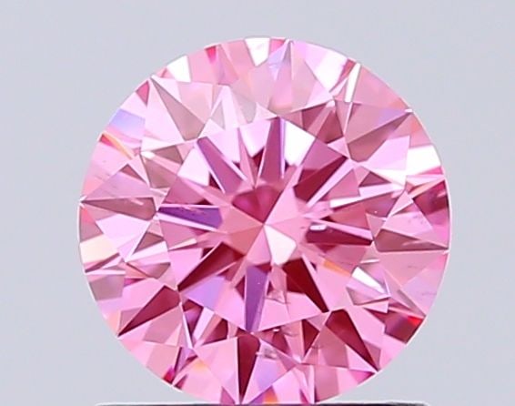 Ideal Loose Diamond - ROUND 1.01ct Fancy Vivid Pink SI1: Ideal Loose Diamond - ROUND 1.01ct Fancy Vivid Pink SI1 Source: This is a real non-mined Diamond that has been grown in a lab Shape: ROUND Carats: 1.01 Color: Fancy Vivid Pink Certification: IGI Video