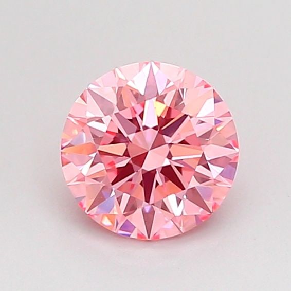 Ideal Loose Diamond - ROUND 0.73ct Fancy Vivid Pink VVS2: Ideal Loose Diamond - ROUND 0.73ct Fancy Vivid Pink VVS2 Source: This is a real non-mined Diamond that has been grown in a lab Shape: ROUND Carats: 0.73 Color: Fancy Vivid Pink Certification: IGI Vide