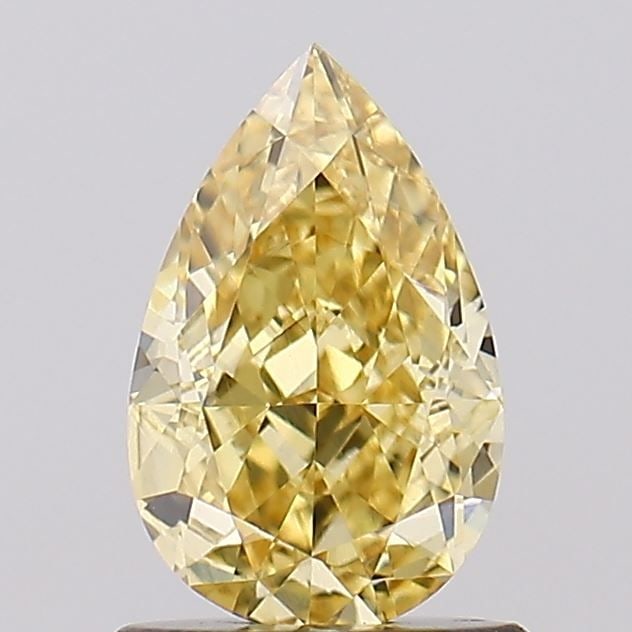 Loose Diamond - PEAR 1.03ct Fancy Intense Yellow VVS2: Loose Diamond - PEAR 1.03ct Fancy Intense Yellow VVS2 Source: This is a real non-mined Diamond that has been grown in a lab Shape: PEAR Carats: 1.03 Color: Fancy Intense Yellow Certification: IGI Vide