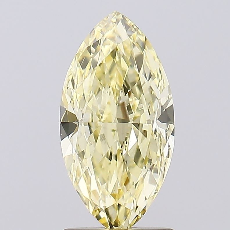 Loose Diamond - MARQUISE 2.08ct Fancy Yellow VS1: Loose Diamond - MARQUISE 2.08ct Fancy Yellow VS1 Source: This is a real non-mined Diamond that has been grown in a lab Shape: MARQUISE Carats: 2.08 Color: Fancy Yellow Certification: IGI Video: