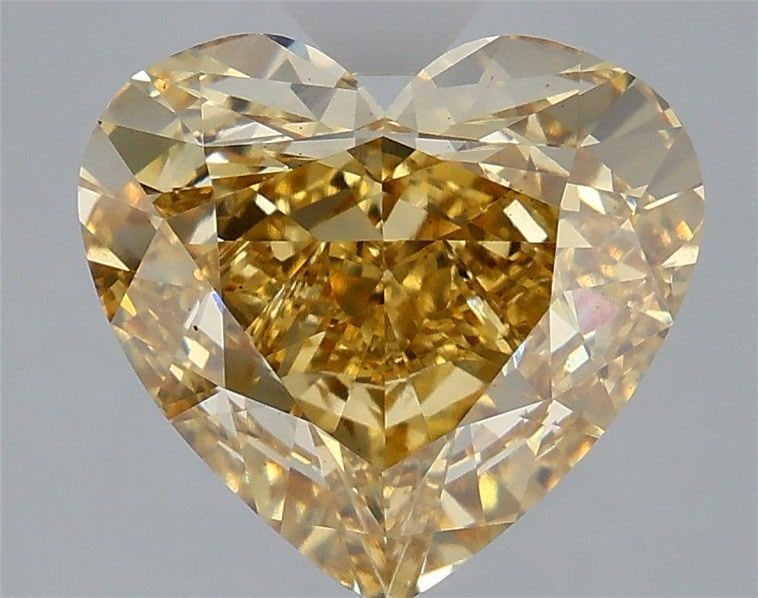 Loose Diamond - HEART 6.04ct Fancy Vivid Yellow VS2: Loose Diamond - HEART 6.04ct Fancy Vivid Yellow VS2 Source: This is a real non-mined Diamond that has been grown in a lab Shape: HEART Carats: 6.04 Color: Fancy Vivid Yellow Certification: IGI Video:
