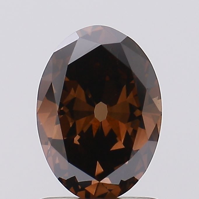 Loose Diamond - OVAL 1.0ct Fancy Deep Brown VS1: Loose Diamond - OVAL 1.0ct Fancy Deep Brown VS1 Source: This is a real non-mined Diamond that has been grown in a lab Shape: OVAL Carats: 1.0 Color: Fancy Deep Brown Certification: IGI Video: