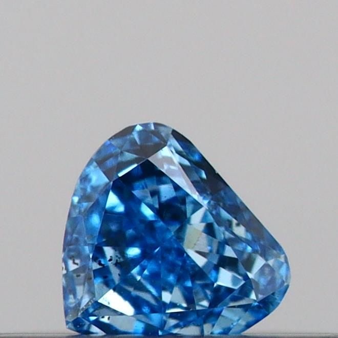 Loose Diamond - HEART 0.12ct Fancy Vivid Blue VS2: Loose Diamond - HEART 0.12ct Fancy Vivid Blue VS2 Source: This is a real non-mined Diamond that has been grown in a lab Shape: HEART Carats: 0.12 Color: Fancy Vivid Blue Certification: IGI Video:
