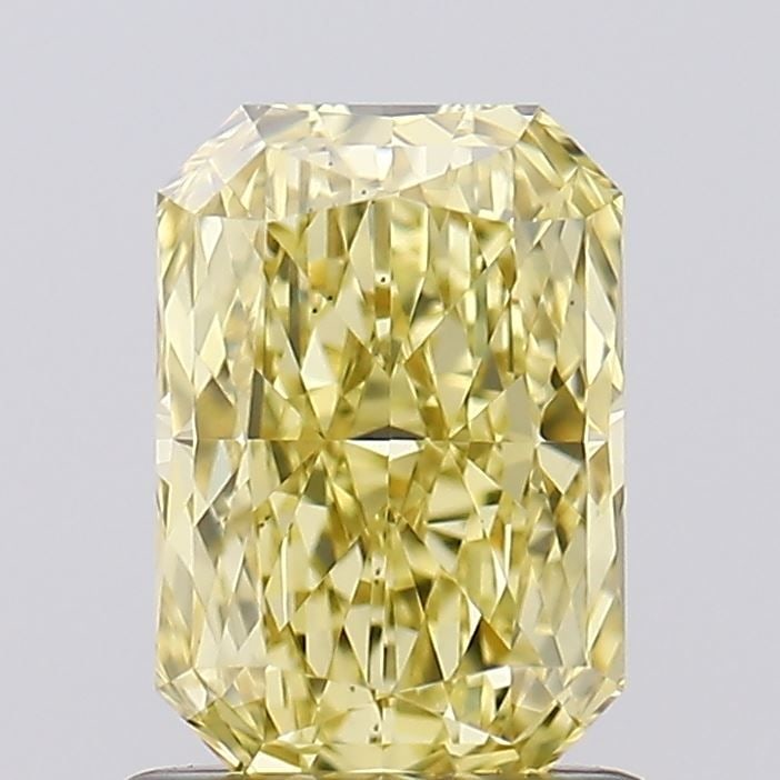 Loose Diamond - RADIANT 1.09ct Fancy Intense Yellow VS1: Loose Diamond - RADIANT 1.09ct Fancy Intense Yellow VS1 Source: This is a real non-mined Diamond that has been grown in a lab Shape: RADIANT Carats: 1.09 Color: Fancy Intense Yellow Certification: IGI