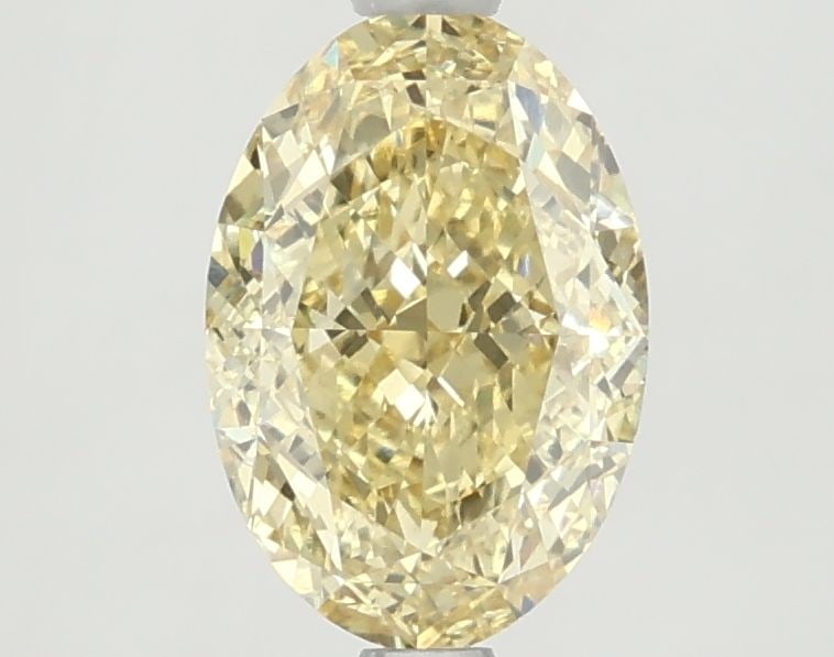 Loose Diamond - OVAL 2.08ct Fancy Vivid Yellow VS1: Loose Diamond - OVAL 2.08ct Fancy Vivid Yellow VS1 Source: This is a real non-mined Diamond that has been grown in a lab Shape: OVAL Carats: 2.08 Color: Fancy Vivid Yellow Certification: IGI Video: