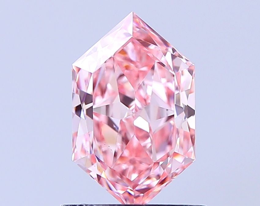 Loose Diamond - HEXAGONAL 1.06ct Fancy Vivid Pink VS1: Loose Diamond - HEXAGONAL 1.06ct Fancy Vivid Pink VS1 Source: This is a real non-mined Diamond that has been grown in a lab Shape: HEXAGONAL Carats: 1.06 Color: Fancy Vivid Pink Certification: IGI Vid