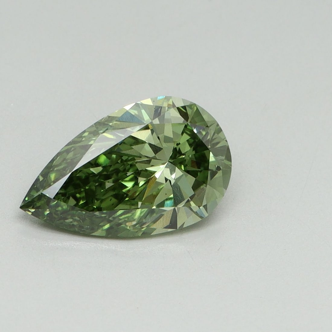 Loose Diamond - PEAR 1.5ct Fancy Vivid Green VS2: Loose Diamond - PEAR 1.5ct Fancy Vivid Green VS2 Source: This is a real non-mined Diamond that has been grown in a lab Shape: PEAR Carats: 1.5 Color: Fancy Vivid Green Certification: IGI Video:
