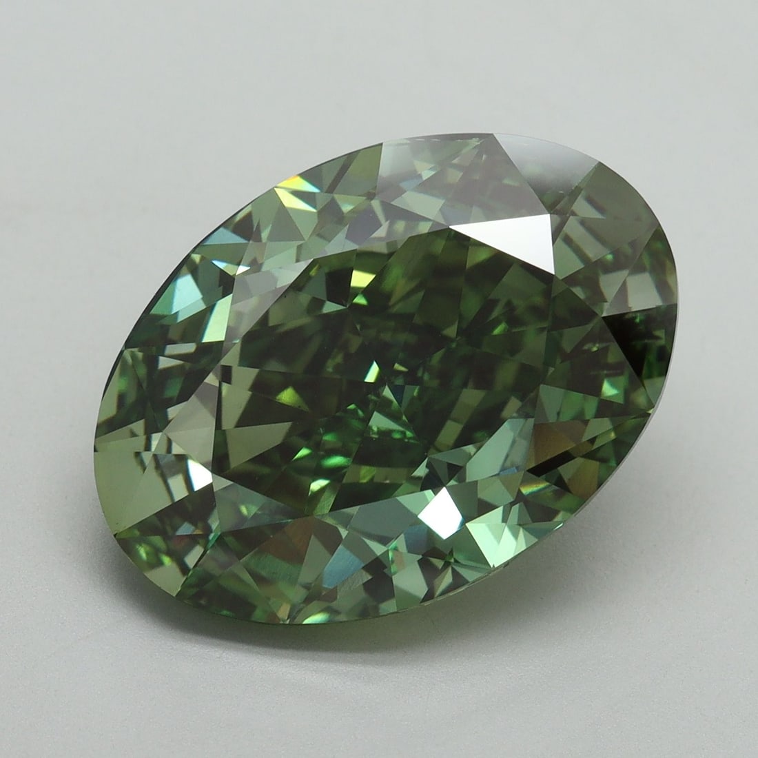 Loose Diamond - OVAL 10.22ct Fancy Vivid Green VS1: Loose Diamond - OVAL 10.22ct Fancy Vivid Green VS1 Source: This is a real non-mined Diamond that has been grown in a lab Shape: OVAL Carats: 10.22 Color: Fancy Vivid Green Certification: IGI Video:
