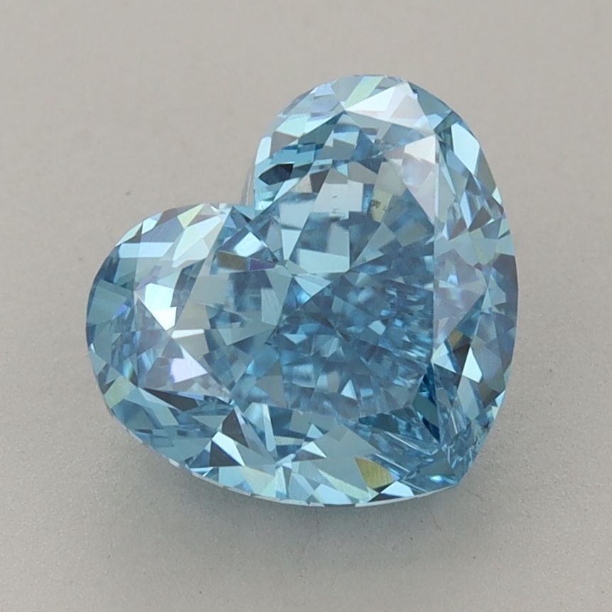 Loose Diamond - HEART 3.06ct Fancy Vivid Blue VS2: Loose Diamond - HEART 3.06ct Fancy Vivid Blue VS2 Source: This is a real non-mined Diamond that has been grown in a lab Shape: HEART Carats: 3.06 Color: Fancy Vivid Blue Certification: IGI Video: