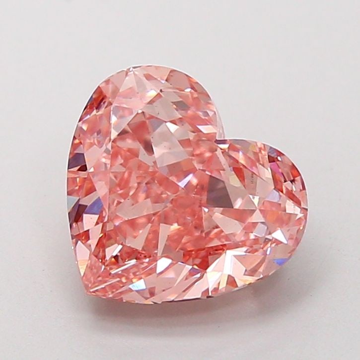 Loose Diamond - HEART 3.02ct Fancy Vivid Pink VS2: Loose Diamond - HEART 3.02ct Fancy Vivid Pink VS2 Source: This is a real non-mined Diamond that has been grown in a lab Shape: HEART Carats: 3.02 Color: Fancy Vivid Pink Certification: IGI Video: