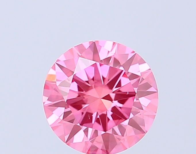 Loose Diamond - ROUND 0.9ct Fancy Vivid Pink VS2: Loose Diamond - ROUND 0.9ct Fancy Vivid Pink VS2 Source: This is a real non-mined Diamond that has been grown in a lab Shape: ROUND Carats: 0.9 Color: Fancy Vivid Pink Certification: IGI Video: