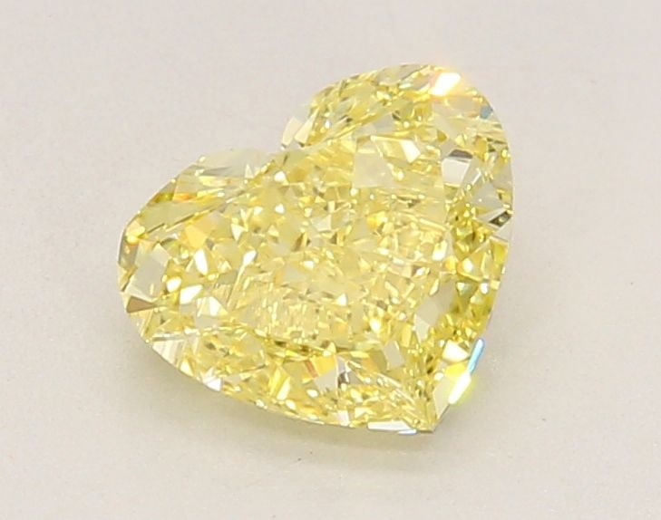 Loose Diamond - HEART 1.26ct Fancy Intense Yellow VVS2: Loose Diamond - HEART 1.26ct Fancy Intense Yellow VVS2 Source: This is a real non-mined Diamond that has been grown in a lab Shape: HEART Carats: 1.26 Color: Fancy Intense Yellow Certification: IGI Vi