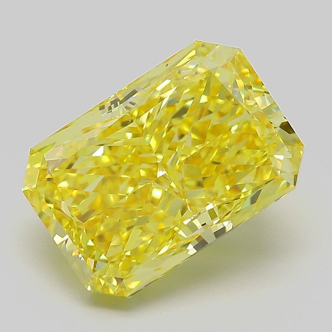 Loose Diamond - RADIANT 7.04ct Fancy Vivid Yellow VS1: Loose Diamond - RADIANT 7.04ct Fancy Vivid Yellow VS1 Source: This is a real non-mined Diamond that has been grown in a lab Shape: RADIANT Carats: 7.04 Color: Fancy Vivid Yellow Certification: IGI Vid