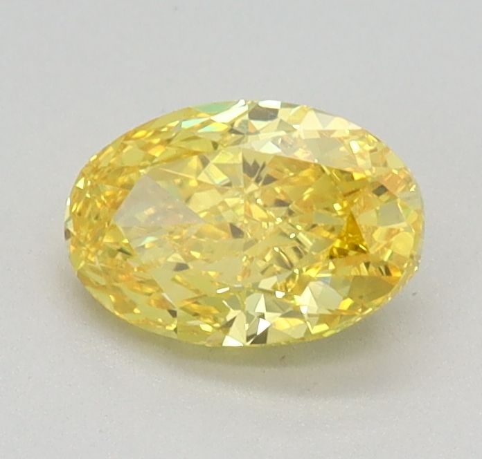 Loose Diamond - OVAL 0.58ct Fancy Vivid Yellow VVS2: Loose Diamond - OVAL 0.58ct Fancy Vivid Yellow VVS2 Source: This is a real non-mined Diamond that has been grown in a lab Shape: OVAL Carats: 0.58 Color: Fancy Vivid Yellow Certification: IGI Video: