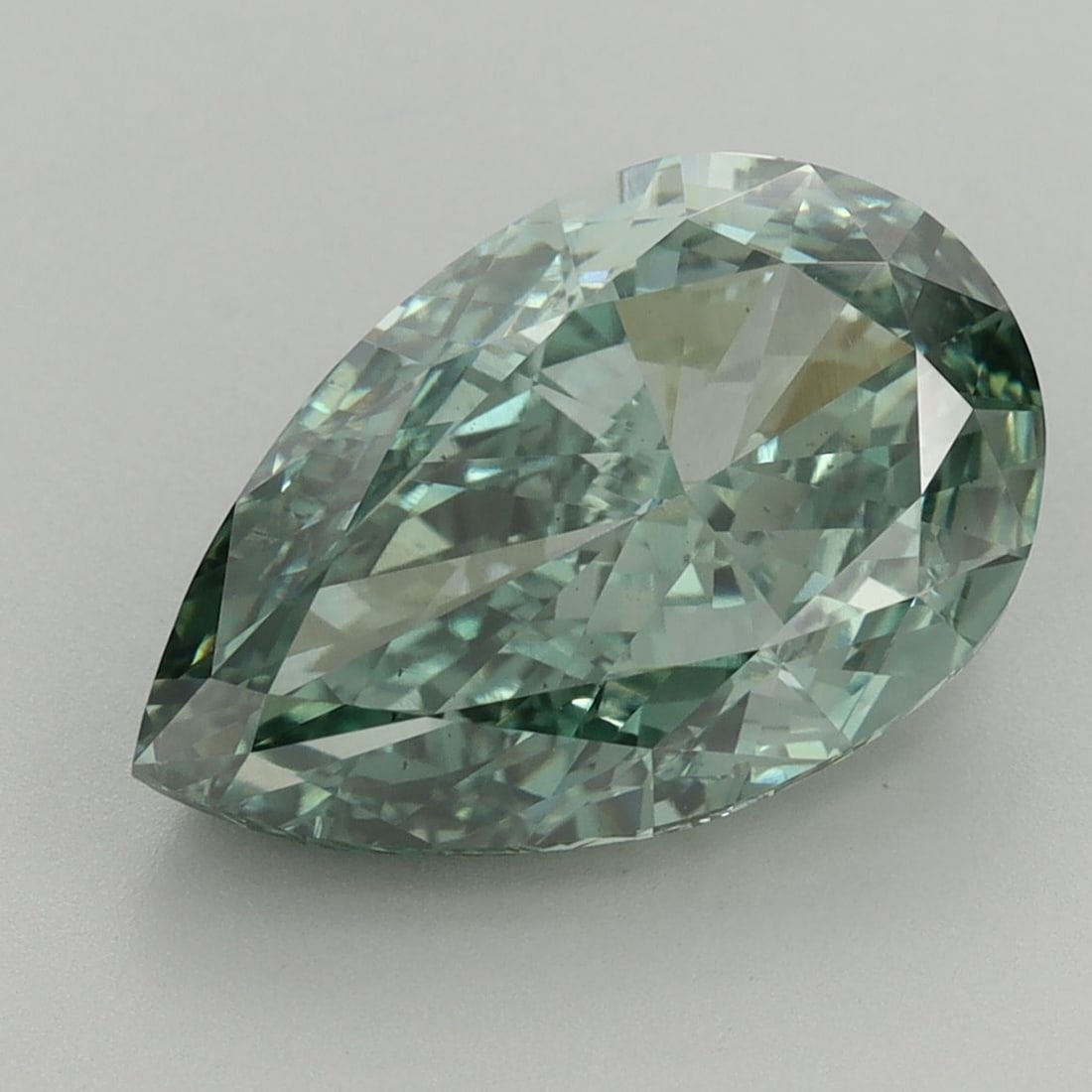 Loose Diamond - PEAR 5.39ct Fancy Vivid Green VS1: Loose Diamond - PEAR 5.39ct Fancy Vivid Green VS1 Source: This is a real non-mined Diamond that has been grown in a lab Shape: PEAR Carats: 5.39 Color: Fancy Vivid Green Certification: IGI Video: