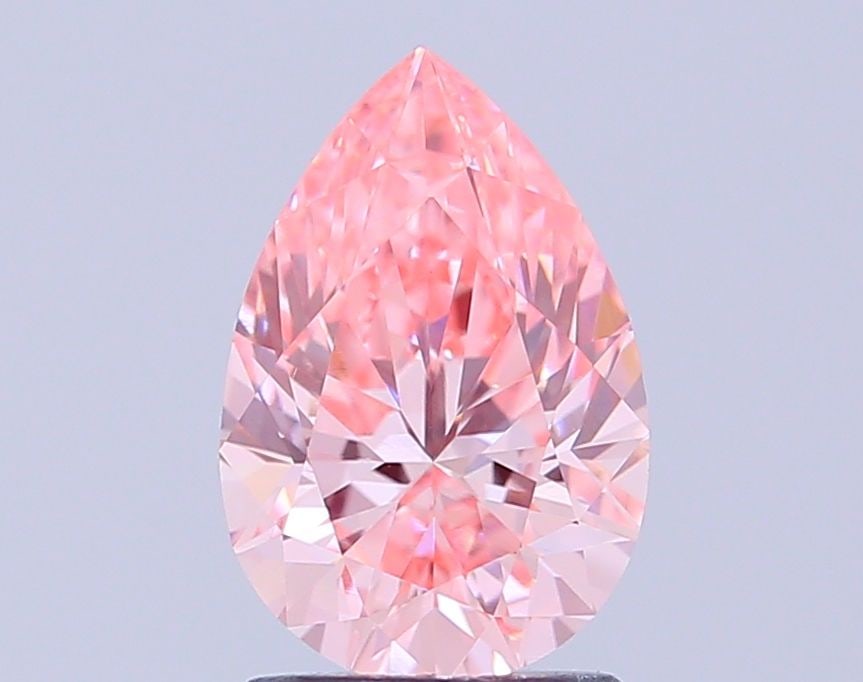 Loose Diamond - PEAR 1.49ct Fancy Vivid Pink VVS2: Loose Diamond - PEAR 1.49ct Fancy Vivid Pink VVS2 Source: This is a real non-mined Diamond that has been grown in a lab Shape: PEAR Carats: 1.49 Color: Fancy Vivid Pink Certification: IGI Video: