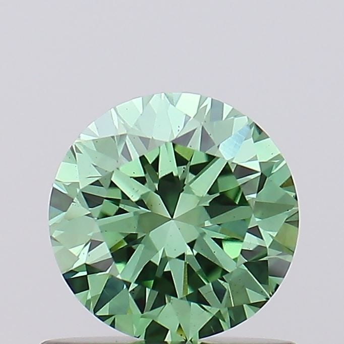 Loose Diamond - ROUND 0.7ct Fancy Vivid Green VS2: Loose Diamond - ROUND 0.7ct Fancy Vivid Green VS2 Source: This is a real non-mined Diamond that has been grown in a lab Shape: ROUND Carats: 0.7 Color: Fancy Vivid Green Certification: IGI Video: