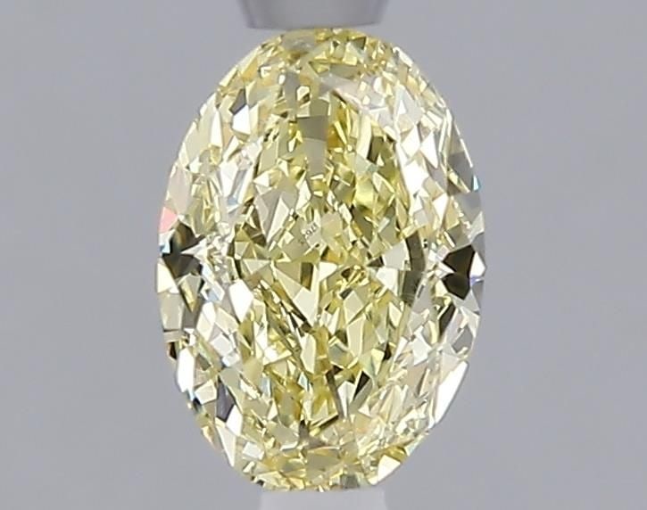 Loose Diamond - OVAL 1.08ct Fancy Intense Yellow VVS2: Loose Diamond - OVAL 1.08ct Fancy Intense Yellow VVS2 Source: This is a real non-mined Diamond that has been grown in a lab Shape: OVAL Carats: 1.08 Color: Fancy Intense Yellow Certification: IGI Vide