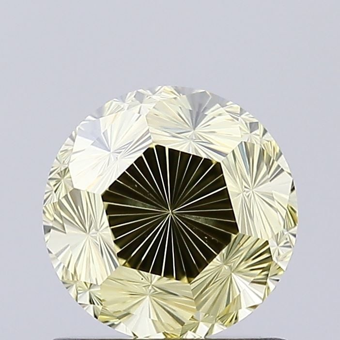 Loose Diamond - OTHER 1.01ct Fancy Yellow VS1: Loose Diamond - OTHER 1.01ct Fancy Yellow VS1 Source: This is a real non-mined Diamond that has been grown in a lab Shape: OTHER Carats: 1.01 Color: Fancy Yellow Certification: IGI Video: