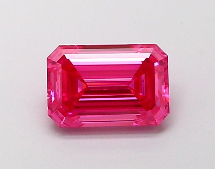 Loose Diamond - EMERALD 1.61ct Fancy Vivid Pink VVS2: Loose Diamond - EMERALD 1.61ct Fancy Vivid Pink VVS2 Source: This is a real non-mined Diamond that has been grown in a lab Shape: EMERALD Carats: 1.61 Color: Fancy Vivid Pink Certification: IGI Video: