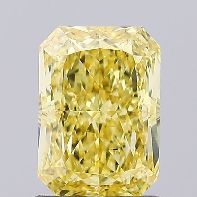 Loose Diamond - RADIANT 1.44ct Fancy Vivid Yellow VS2: Loose Diamond - RADIANT 1.44ct Fancy Vivid Yellow VS2 Source: This is a real non-mined Diamond that has been grown in a lab Shape: RADIANT Carats: 1.44 Color: Fancy Vivid Yellow Certification: IGI Vid