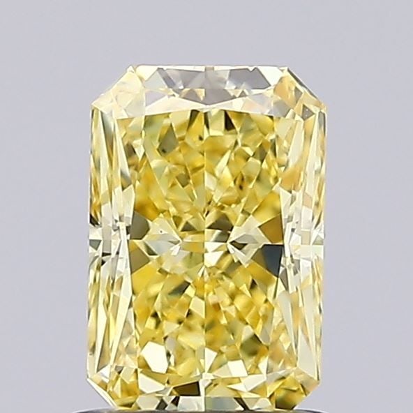 Loose Diamond - RADIANT 1.12ct Fancy Vivid Yellow VVS2: Loose Diamond - RADIANT 1.12ct Fancy Vivid Yellow VVS2 Source: This is a real non-mined Diamond that has been grown in a lab Shape: RADIANT Carats: 1.12 Color: Fancy Vivid Yellow Certification: IGI Vi
