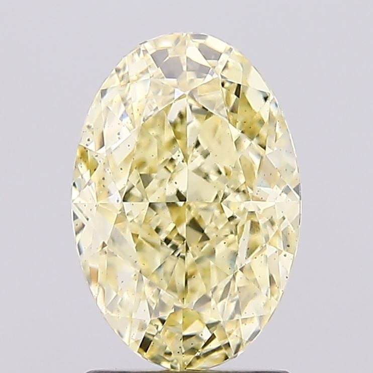 Loose Diamond - OVAL 2.11ct Fancy Light Yellow SI1: Loose Diamond - OVAL 2.11ct Fancy Light Yellow SI1 Source: This is a real non-mined Diamond that has been grown in a lab Shape: OVAL Carats: 2.11 Color: Fancy Light Yellow Certification: IGI Video: