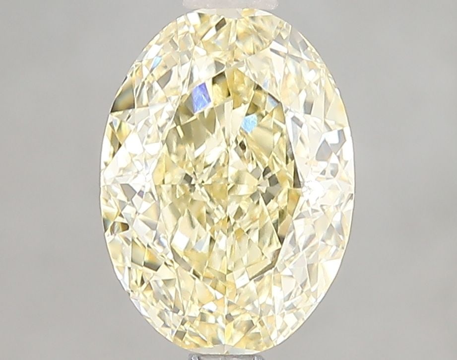Loose Diamond - OVAL 2.06ct Fancy Intense Yellow VS1: Loose Diamond - OVAL 2.06ct Fancy Intense Yellow VS1 Source: This is a real non-mined Diamond that has been grown in a lab Shape: OVAL Carats: 2.06 Color: Fancy Intense Yellow Certification: IGI Video