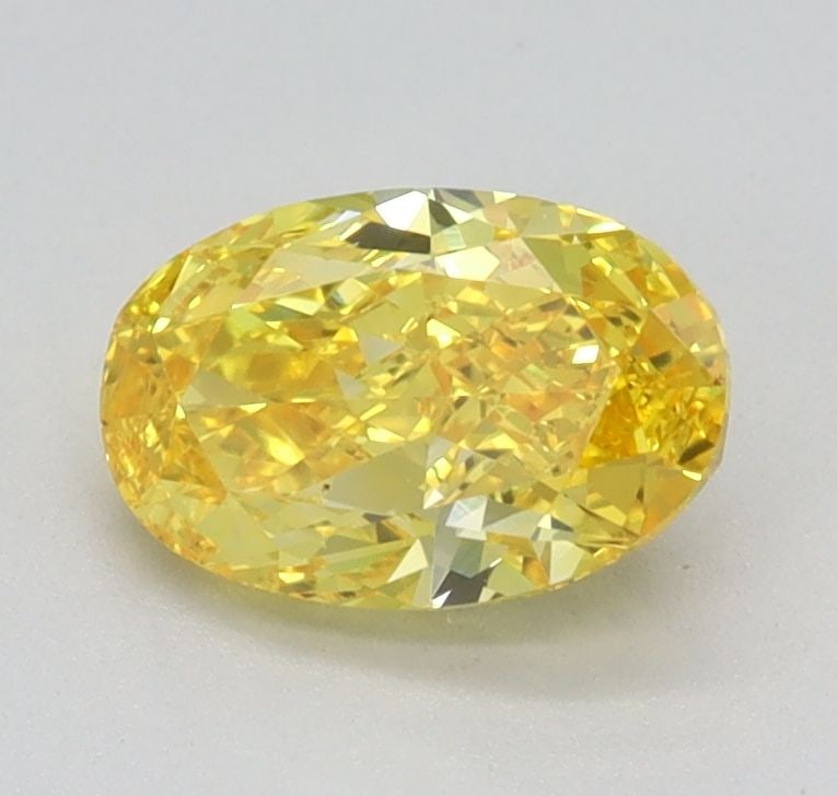 Loose Diamond - OVAL 0.8ct Fancy Vivid Yellow VS1: Loose Diamond - OVAL 0.8ct Fancy Vivid Yellow VS1 Source: This is a real non-mined Diamond that has been grown in a lab Shape: OVAL Carats: 0.8 Color: Fancy Vivid Yellow Certification: IGI Video:
