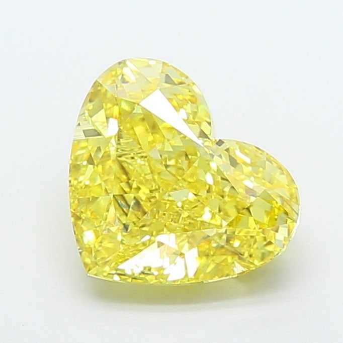 Loose Diamond - HEART 6.06ct Fancy Vivid Yellow VS2: Loose Diamond - HEART 6.06ct Fancy Vivid Yellow VS2 Source: This is a real non-mined Diamond that has been grown in a lab Shape: HEART Carats: 6.06 Color: Fancy Vivid Yellow Certification: IGI Video: