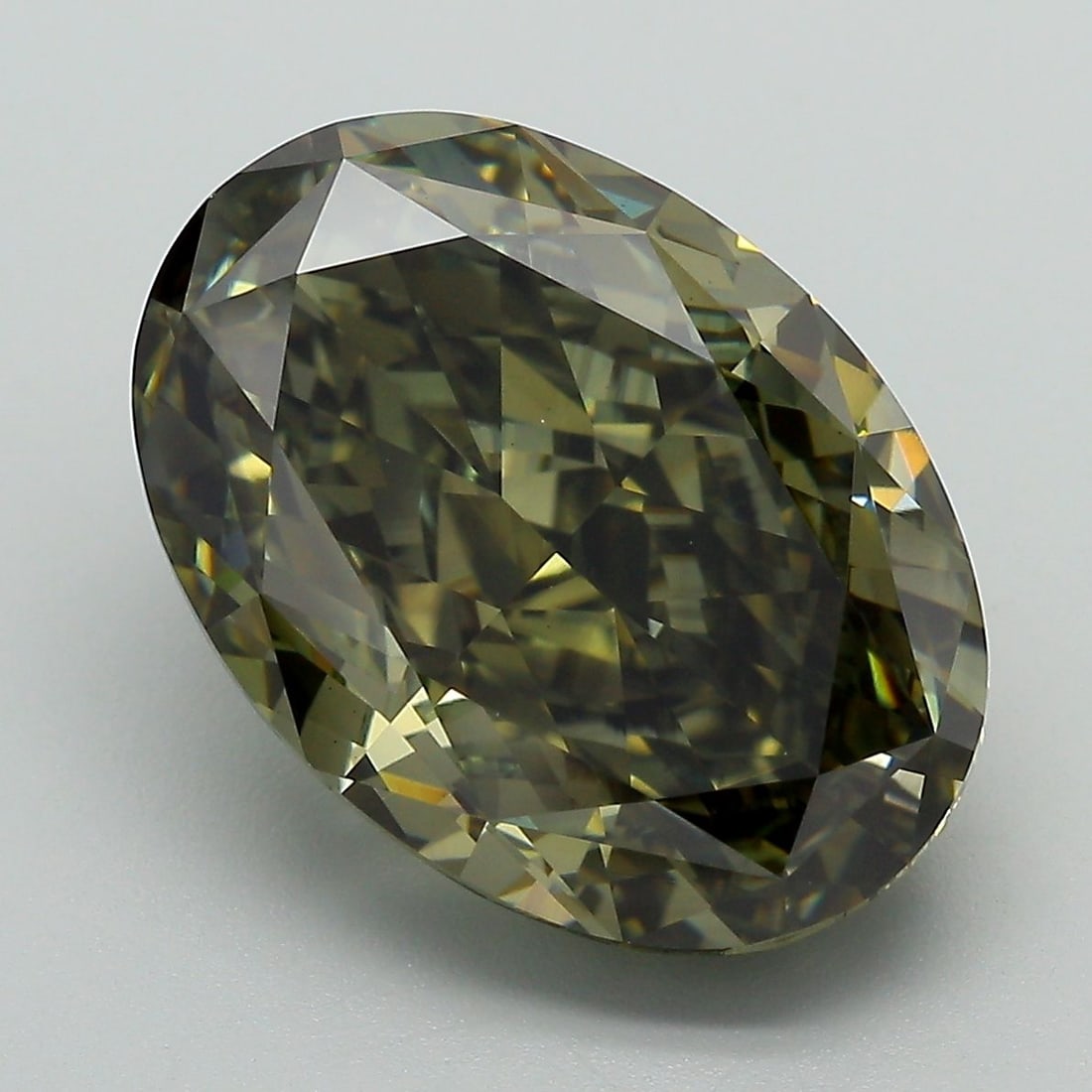 Loose Diamond - OVAL 9.24ct Fancy Deep Gray Green VS1: Loose Diamond - OVAL 9.24ct Fancy Deep Gray Green VS1 Source: This is a real non-mined Diamond that has been grown in a lab Shape: OVAL Carats: 9.24 Color: Fancy Deep Gray Green Certification: IGI Vid