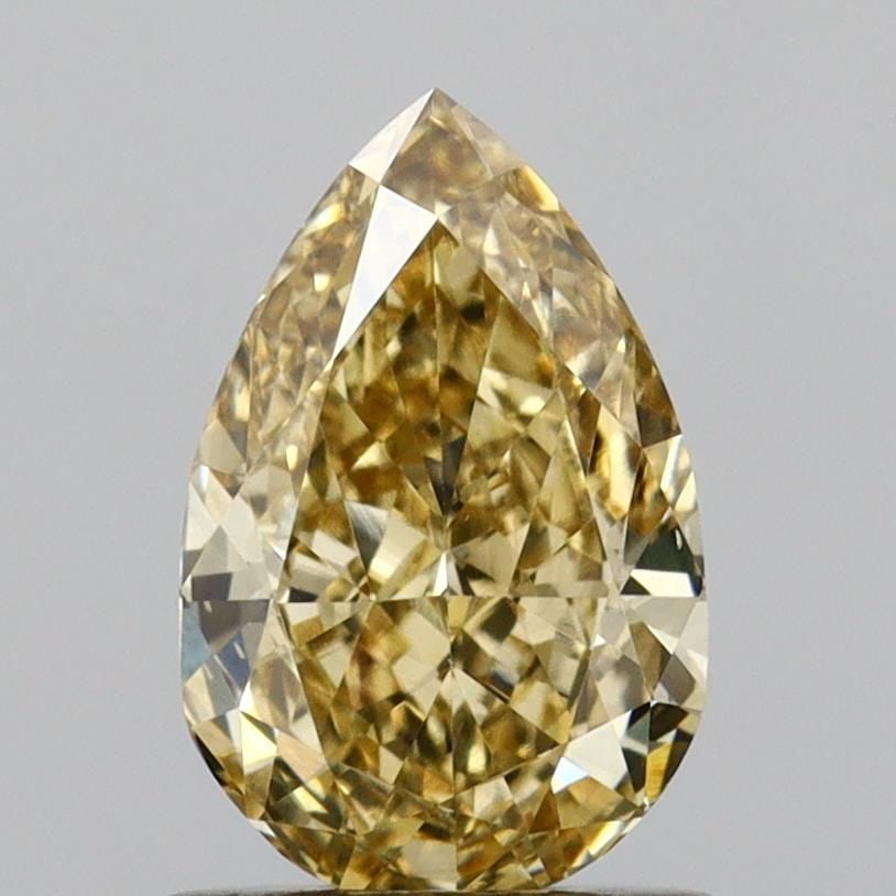 Loose Diamond - PEAR 1.05ct Fancy Yellow VS1: Loose Diamond - PEAR 1.05ct Fancy Yellow VS1 Source: This is a real non-mined Diamond that has been grown in a lab Shape: PEAR Carats: 1.05 Color: Fancy Yellow Certification: IGI Video: