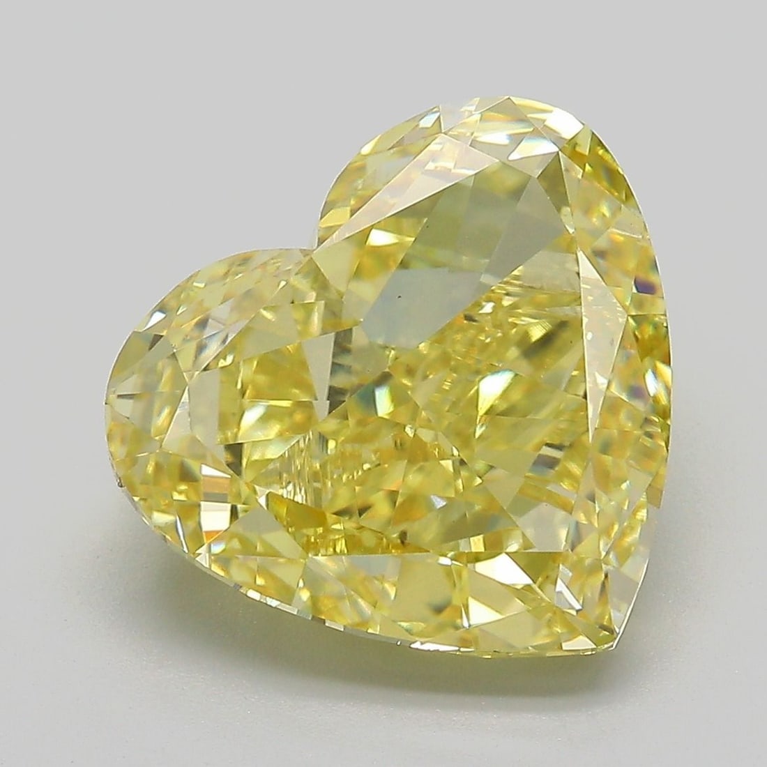 Loose Diamond - HEART 7.05ct Fancy Intense Yellow VS1: Loose Diamond - HEART 7.05ct Fancy Intense Yellow VS1 Source: This is a real non-mined Diamond that has been grown in a lab Shape: HEART Carats: 7.05 Color: Fancy Intense Yellow Certification: IGI Vid