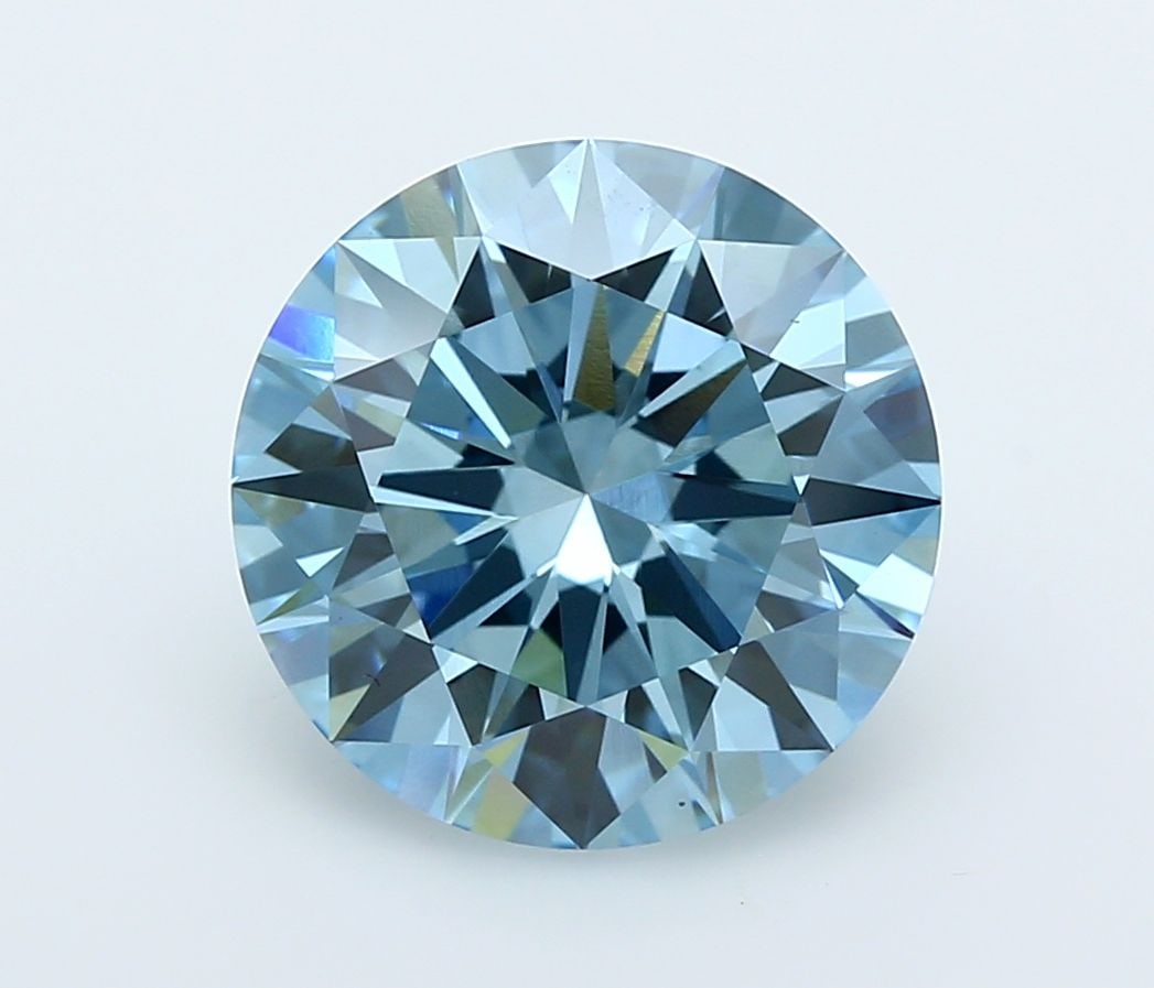 Ideal Loose Diamond - ROUND 5.06ct Fancy Vivid Blue VVS2: Ideal Loose Diamond - ROUND 5.06ct Fancy Vivid Blue VVS2 Source: This is a real non-mined Diamond that has been grown in a lab Shape: ROUND Carats: 5.06 Color: Fancy Vivid Blue Certification: IGI Vide