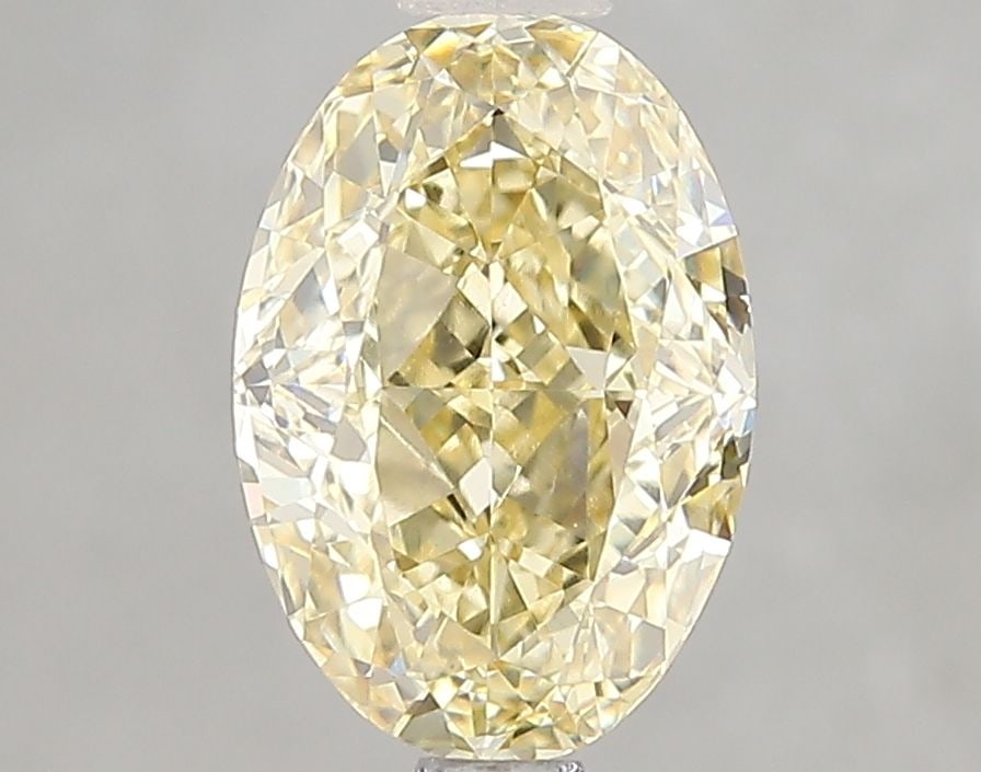 Loose Diamond - OVAL 2.09ct Fancy Intense Yellow VVS2: Loose Diamond - OVAL 2.09ct Fancy Intense Yellow VVS2 Source: This is a real non-mined Diamond that has been grown in a lab Shape: OVAL Carats: 2.09 Color: Fancy Intense Yellow Certification: IGI Vide