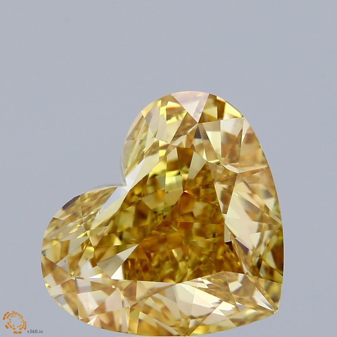 Loose Diamond - HEART 7.63ct Fancy Vivid Brownish Yellow VS1: Loose Diamond - HEART 7.63ct Fancy Vivid Brownish Yellow VS1 Source: This is a real non-mined Diamond that has been grown in a lab Shape: HEART Carats: 7.63 Color: Fancy Vivid Brownish Yellow Certific