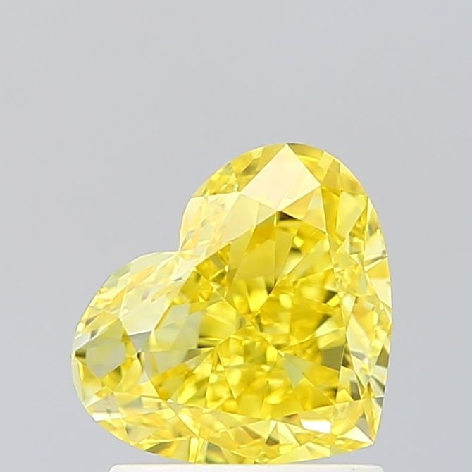 Loose Diamond - HEART 1.5ct Fancy Vivid Yellow VVS2: Loose Diamond - HEART 1.5ct Fancy Vivid Yellow VVS2 Source: This is a real non-mined Diamond that has been grown in a lab Shape: HEART Carats: 1.5 Color: Fancy Vivid Yellow Certification: IGI Video: