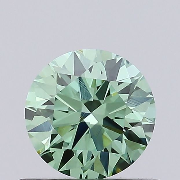 Ideal Loose Diamond - ROUND 0.55ct Fancy Vivid Green VVS2: Ideal Loose Diamond - ROUND 0.55ct Fancy Vivid Green VVS2 Source: This is a real non-mined Diamond that has been grown in a lab Shape: ROUND Carats: 0.55 Color: Fancy Vivid Green Certification: IGI Vi