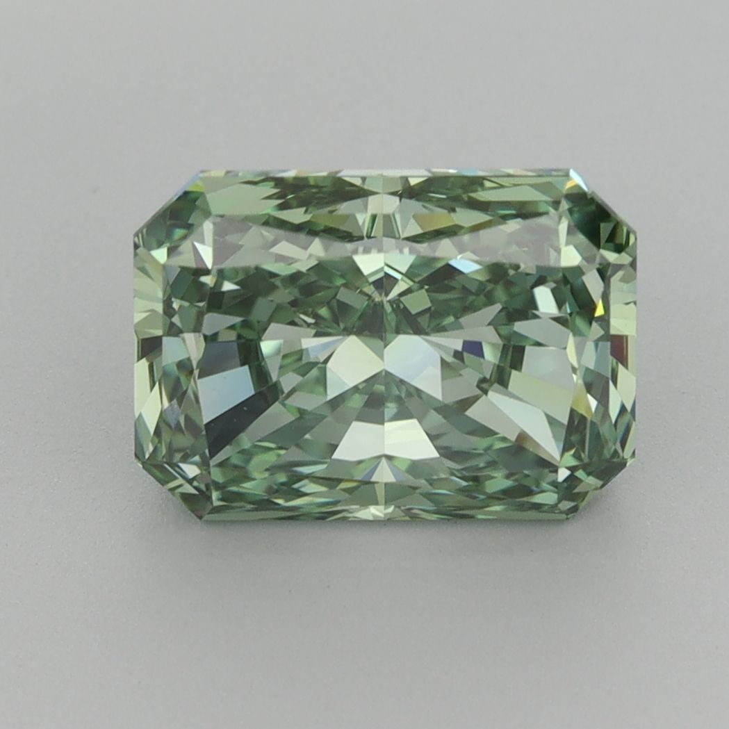 Loose Diamond - RADIANT 3.24ct Fancy Vivid Green VVS2: Loose Diamond - RADIANT 3.24ct Fancy Vivid Green VVS2 Source: This is a real non-mined Diamond that has been grown in a lab Shape: RADIANT Carats: 3.24 Color: Fancy Vivid Green Certification: IGI The 