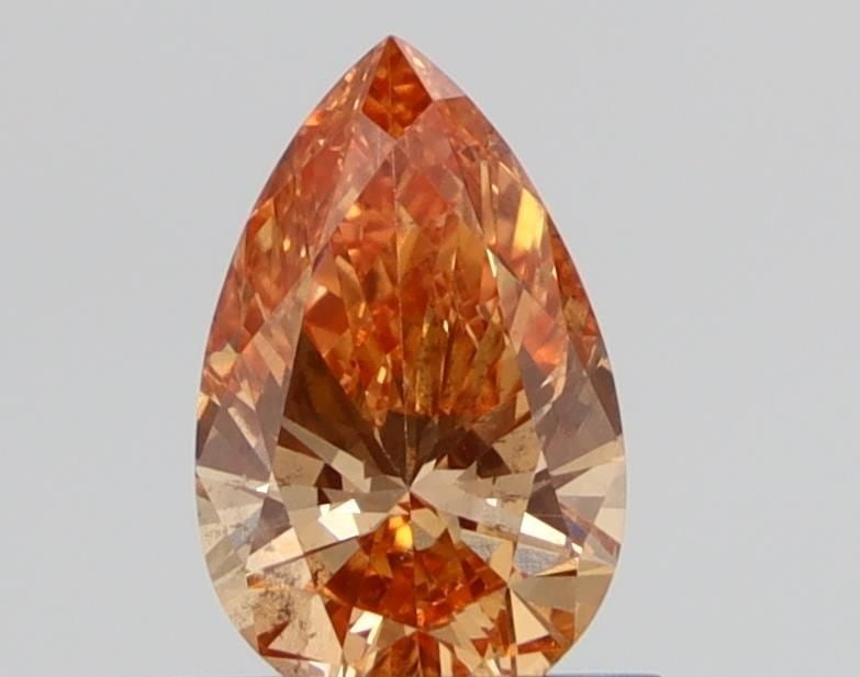 Loose Diamond - PEAR 0.7ct Fancy Orange SI1: Loose Diamond - PEAR 0.7ct Fancy Orange SI1 Source: This is a real non-mined Diamond that has been grown in a lab Shape: PEAR Carats: 0.7 Color: Fancy Orange Certification: NONE Video:
