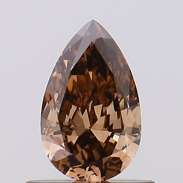 Loose Diamond - PEAR 0.44ct Fancy Brown VS1: Loose Diamond - PEAR 0.44ct Fancy Brown VS1 Source: This is a real non-mined Diamond that has been grown in a lab Shape: PEAR Carats: 0.44 Color: Fancy Brown Certification: NONE Video: