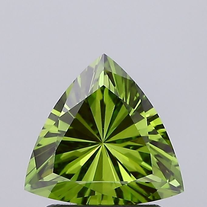 Loose Diamond - TRIANGULAR 1.29ct Fancy Vivid Green VS2: Loose Diamond - TRIANGULAR 1.29ct Fancy Vivid Green VS2 Source: This is a real non-mined Diamond that has been grown in a lab Shape: TRIANGULAR Carats: 1.29 Color: Fancy Vivid Green Certification: IGI