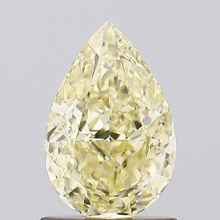 Loose Diamond - PEAR 1.01ct Fancy Yellow VS2: Loose Diamond - PEAR 1.01ct Fancy Yellow VS2 Source: This is a real non-mined Diamond that has been grown in a lab Shape: PEAR Carats: 1.01 Color: Fancy Yellow Certification: IGI Video: