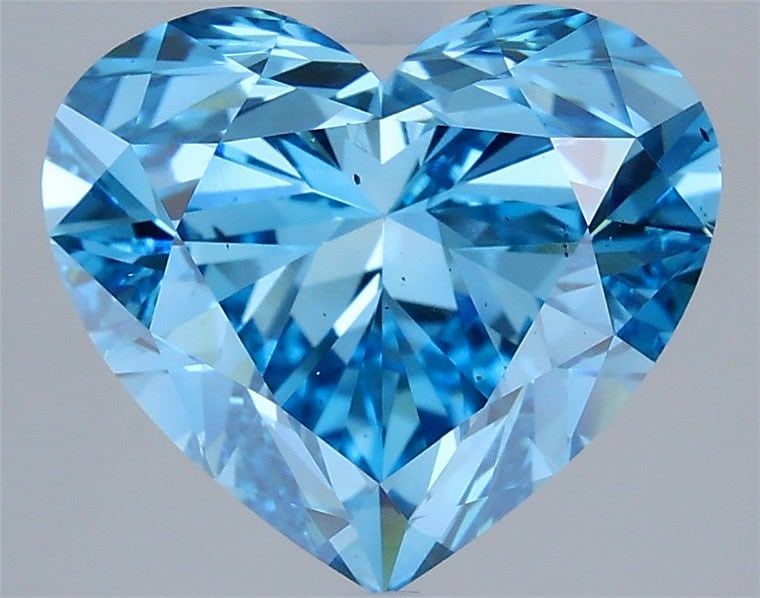 Loose Diamond - HEART 4.99ct Fancy Vivid Blue VS2: Loose Diamond - HEART 4.99ct Fancy Vivid Blue VS2 Source: This is a real non-mined Diamond that has been grown in a lab Shape: HEART Carats: 4.99 Color: Fancy Vivid Blue Certification: IGI Video:
