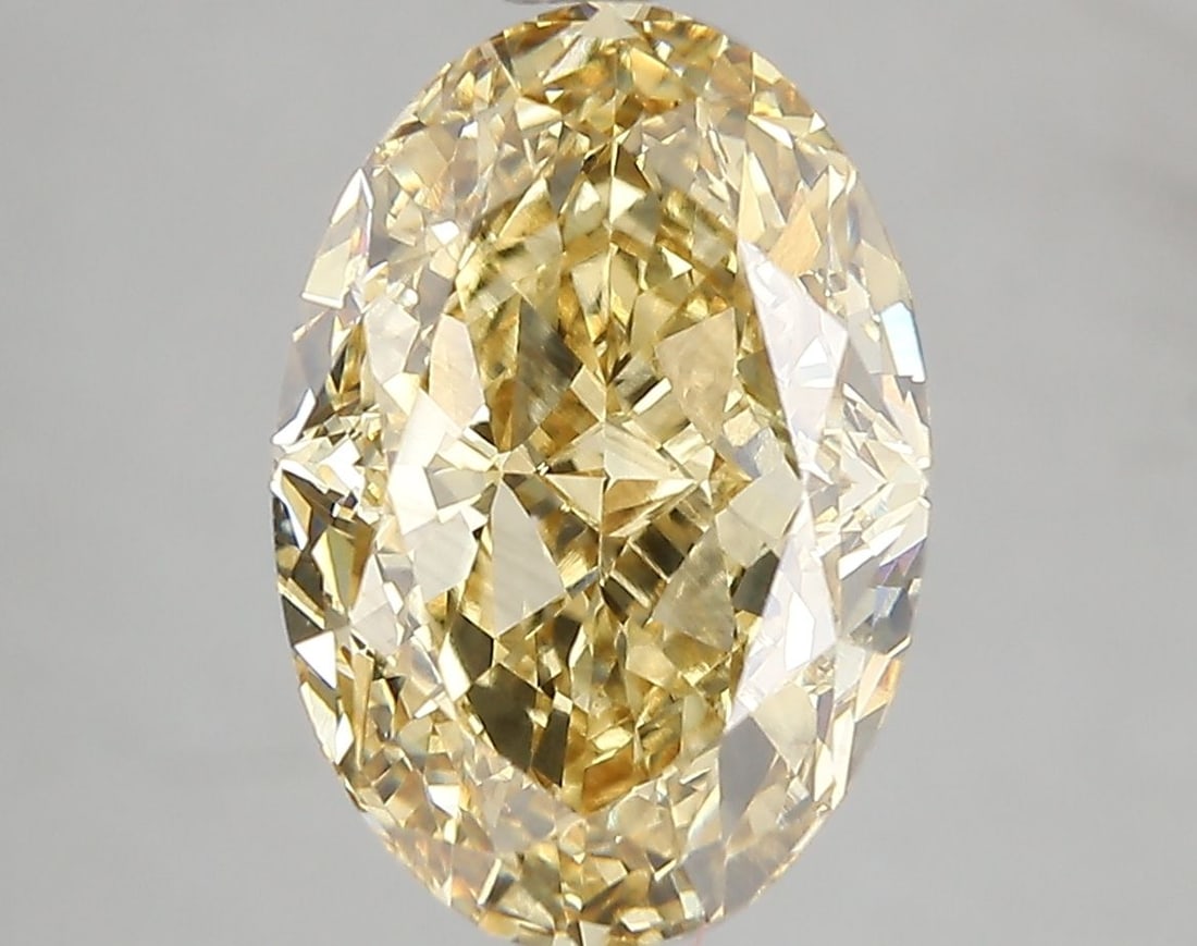 Loose Diamond - OVAL 5.0ct Fancy Vivid Yellow VS2: Loose Diamond - OVAL 5.0ct Fancy Vivid Yellow VS2 Source: This is a real non-mined Diamond that has been grown in a lab Shape: OVAL Carats: 5.0 Color: Fancy Vivid Yellow Certification: IGI Video: