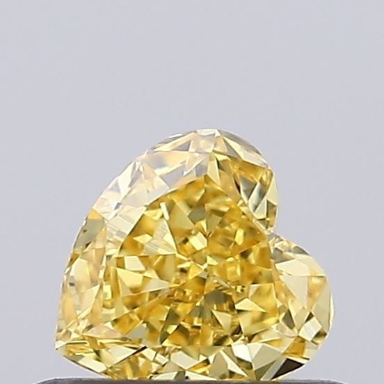Loose Diamond - HEART 0.34ct Fancy Vivid Yellow VS1: Loose Diamond - HEART 0.34ct Fancy Vivid Yellow VS1 Source: This is a real non-mined Diamond that has been grown in a lab Shape: HEART Carats: 0.34 Color: Fancy Vivid Yellow Certification: IGI Video:
