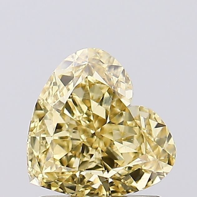 Loose Diamond - HEART 1.3ct Fancy Vivid Yellow VS1: Loose Diamond - HEART 1.3ct Fancy Vivid Yellow VS1 Source: This is a real non-mined Diamond that has been grown in a lab Shape: HEART Carats: 1.3 Color: Fancy Vivid Yellow Certification: IGI Video: