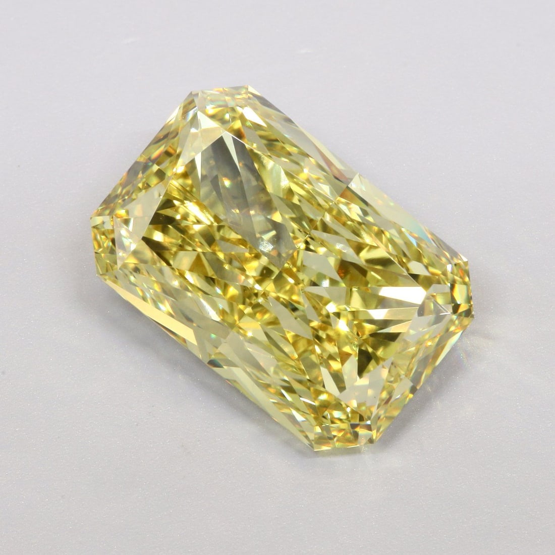 Loose Diamond - RADIANT 10.04ct Fancy Vivid Yellow VS1: Loose Diamond - RADIANT 10.04ct Fancy Vivid Yellow VS1 Source: This is a real non-mined Diamond that has been grown in a lab Shape: RADIANT Carats: 10.04 Color: Fancy Vivid Yellow Certification: IGI V